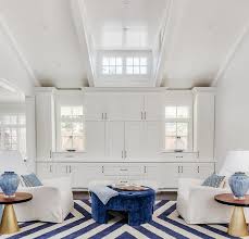Vintage gold accent bedroom designs. White And Blue Bedroom Sitting Area With Gold Accents Transitional Bedroom