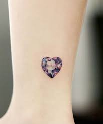 21 Gemstone Tattoos So Pretty You Won T Need Jewelry Anymore Purple Tattoos Gem Tattoo Purple Heart Tattoos