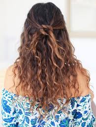 Browse our library of the best reincarnations of the style to find the loose dutch braids and loose curls make the perfect combo for a beautiful but simple half up half down hairstyle. 45 Charming Bride S Wedding Hairstyles For Naturally Curly Hair Weddingcraze