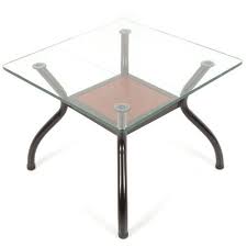 It is accompanied by a classic chandelier and a wooden console table filled with framed photos and lampshades. Modern Square Centre Glass Table Engee Designs Id 20839103991