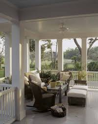 Wrap around porch with a cozy sitting corner and wicker furniture. 24 Relaxing Wraparound Porch Decor Ideas Shelterness