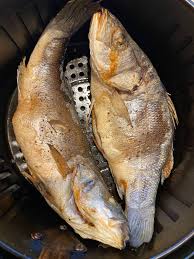 Fish sinigang or sinigang na isda is a type of filipino fish soup wherein fish is cooked in a sour broth together with a variety of vegetables. Air Fryer Whole Fish Recipe Melanie Cooks