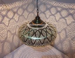 When illuminated its patterns cast a stunning lighting effect the namesake mobius shades are weightless, flowing cones of light and shadow. Moroccan Pendant Light Brass Antique Lamps Vintage Moroccan Lights