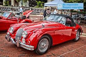 Wow Two Stunning Red Beauties Jaguar Xk 150s Roadster A Xk 140 Dhc Photo Courtesy M T Harmon Photography Http W Classic Sports Cars Jaguar Jaguar Car