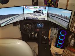 This cockpit can be opened and closed with… My Homemade Sim Racing Cockpit Finally Finished Added Carpet Upgraded To 3 Monitors Soundbar And Went From A G29 To Fanatec Clubsport Equipment Wind Simulators Poweramps Running 4 Shakers A Push Button