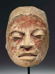 A MAYAN JADE HEAD OF THE MAIZE GOD , CLASSIC, CA. A.D. 450-650