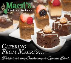 Macri's famous meatballs smothered with macri marinara tomato sauce, pecorino romano cheese and melted mozzarella cheese. Best Caterers Michiana