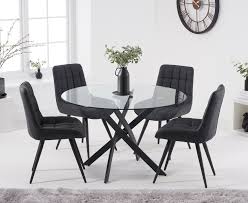 The magna round glass table puts a practical, versatile spin on scandinavian design. Mara 120cm Round Glass Dining Table With Heidi Chairs Grey 4 Chairs 799 00 Save Up To 16 Off