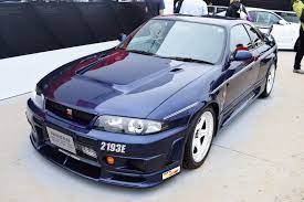 one of 44 nissan skyline gt r nismo 400r s spotted at goodwood carscoops nissan gtr skyline nissan skyline r33 nissan skyline