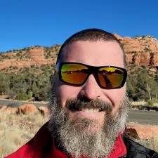 What is the going rate to get an epoxy floor put in for 2 car garage floor