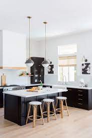 How A Designer Navigated A Kitchen Renovation For Her Parents Black Kitchen Cabinets Kitchen Design Kitchen Renovation