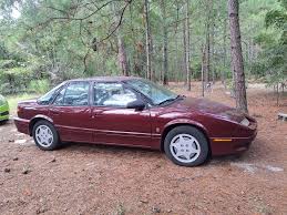 Image result for Dark Red 1995 Saturn