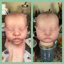 I don't normally paint a doll more than once but Levi is amongst a small  handful of sculpts that I have! And it's so interesting to compare and see  the difference. The