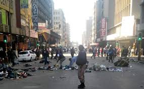 In johannesburg, hundreds defied restrictions in two disenfranchised suburbs, but their protests ended in violence, looting and 25 arrests, police said. Joburg Police To Monitor Cbd After Violent Protests