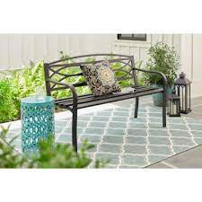Crafted from high density eucalyptus (shorea), this outdoor bench can withstand the trials of sun and rain as it sits on your porch or patio. Outdoor Benches Patio Chairs The Home Depot
