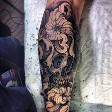 A bold arm tattoo design which focusses on a pyramid and clock merging. 50 Skull Sleeve Tattoos For Men Masculine Design Ideas
