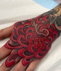 The top of your index finger can be painted with black colour to highlight an exact finger bone structure. Japanese Flower Tattoos A Visual Guide