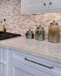 Portico Cream Quartz Pairs The Sophisticated Movement Of Natural Stone With The Low M Kitchen Countertops Pictures Stone Countertops Kitchen Quartz Countertops