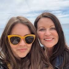 Lacey Turner poses with rarely seen lookalike mum to mark her 60th birthday 