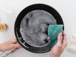 Scrub with a scrubbing pad the following day. Using And Caring For Nonstick Pans