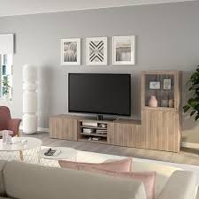 Besta Tv Storage Combination Glass Doors Walnut Effect Light Gray Lappviken Gray Stained Walnut Eff Clear Glass 94 1 2x16 1 2x50 3 4 Shop Here Ikea Tv Storage Ikea Glass Door