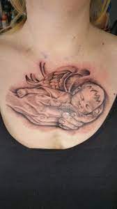 Baby Angel In Hands By Paul 13 Tattoo Worthing Guardian Angel Tattoo Designs Tattoo Designs Tattoos