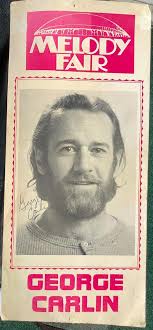 George Carlin autographed advertising sign from Melody Fair Buffalo,N.Y.  7"X15"