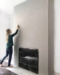One we had wall one secured to the exterior wall, we started building our second wall. Diy A Cement Look Fireplace For Less Than 100 Angela Rose Home