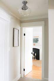 A Farmhouse Style Hallway Makeover Making It In The Mountains Hallway Light Fixtures Farmhouse Light Fixtures Farmhouse Lighting