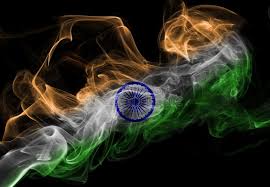 With the ashoka chakra, a 24 spoke wheel, in navy blue at its centre. 811 India Flag Smoke Photos Free Royalty Free Stock Photos From Dreamstime