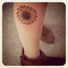 Birthmark On Leg Meaning Sunflower Tattoo Would So Get Something Like This Incorporated With My Bff Fe Sunflower Tattoo Design Sunflower Tattoo Small Sunflower Tattoos