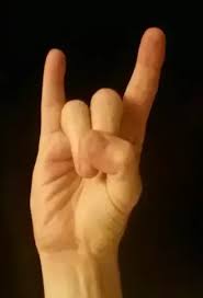 In palm reading, the little finger is often associated with dreams and ambitions for the future. What Is The Difference Between The I Love You Hand Sign And The Devil S Horn Sign Quora