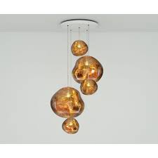 Jewelry enthusiasts often melt gold coins. Tom Dixon Official Grosses Rundes Hangeleuchtensystem Melt Gold