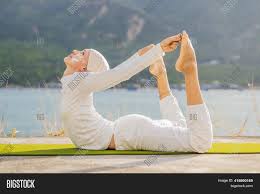 When this energy is awakened, it begins its journey upwards through your central energy channel, the sushumna. Kundalini Yoga Woman Image Photo Free Trial Bigstock