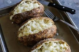 Toss potatoes, oil, and rosemary on a rimmed baking sheet. Easy Baked Potato Recipe In The Oven Microwave Air Fryer Grill
