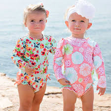 These Long Sleeve One Piece Rash Guard Baby And Toddler Girls Swimsuits Are A Customer Favorite For Sure Baby Girl Swimsuit Baby Girl Bottoms Toddler Swimsuits