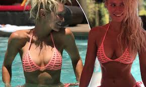 Nicky Whelan shows off svelte physique in neon cut out bikini | Daily Mail  Online