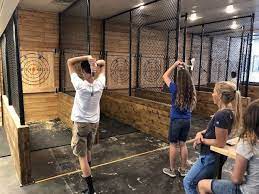 Axe Throwing Is A Sport In Which The Competitor Throws An Axe At A Target Attempting To Hit The Bulls Eye As Near As Possib Throwing Axe Axe Home Axe Throwing