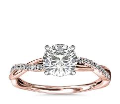 Rose gold engagement rings set with oval diamonds are becoming increasingly sought after, and for good reason. Petite Twist Diamond Engagement Ring In 14k Rose Gold 1 10 Ct Tw Blue Nile