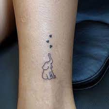 75 Best Elephant Tattoo Designs For Women 2021 Guide Elephant Tattoo Design Elephant Tattoo Small Cute Elephant Tattoo