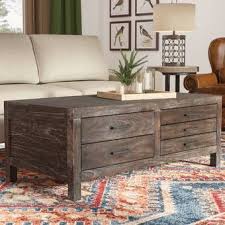 At first a compact table, this wood and white lacquer find can stretch its top 360 degrees. Macsen Lift Top Floor Shelf Coffee Table With Storage Coffee Table With Storage Lift Top Coffee Table Coffee Table