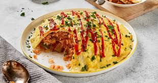 Japanese omurice is a fusion dish that is delicious and filling too. Omurice Japanese Stir Fried Rice With Eggs Eggland S Best