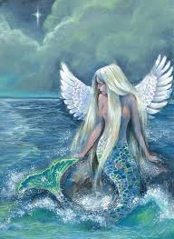 Fantasy woman real mermaid with trident myth goddess of sea with golden tail sitting in sunset on rocks. Beauty Mermaid And Fantasy Image 6852740 On Favim Com