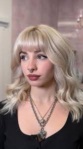 Doing hair and forcing my clients to sing duets with me is my hobby!