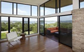 Large heritage home with massive dormer and turret. Stone And Wood Interior Design In Eco Style Lake Travis Residence Modern Houses