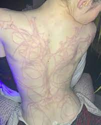 Check spelling or type a new query. Elon Musk S Girlfriend Grimes Gets Alien Inspired White Ink Back Tattoo