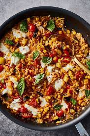 One Pot Orzo With Tomatoes Corn And Zucchini Recipe Recipe In 2021 Zucchini Corn Recipe Vegetarian Recipes One Pot Orzo