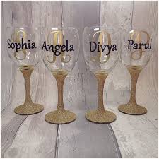 Suggestions for a gift basket include colorful napkins, a scented. Monogram Personalised Glitter Wine Glass Birthday Wedding Diy Wine Glasses Diy Wine Glass Decorated Wine Glasses