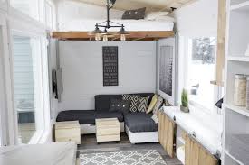A Tiny House With A Unique Clever Bedroom Solution Modern Tiny House Tiny House Storage Best Tiny House