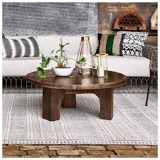 Made out of wood and featuring a unique distressed finish. Cruz 38 Wide Antique Rust Round Outdoor Coffee Table 89j98 Lamps Plus